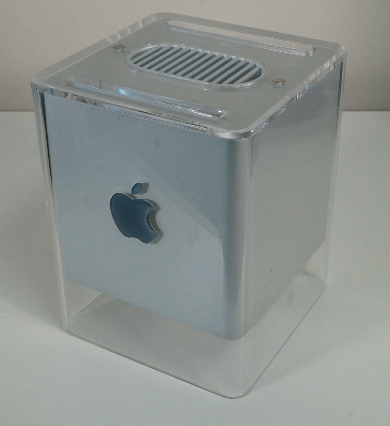 The Power Mac G4 Cube, an 8-inch transparent acrylic cube containing a complete computer, launched July 2000 and discontinued July 2001